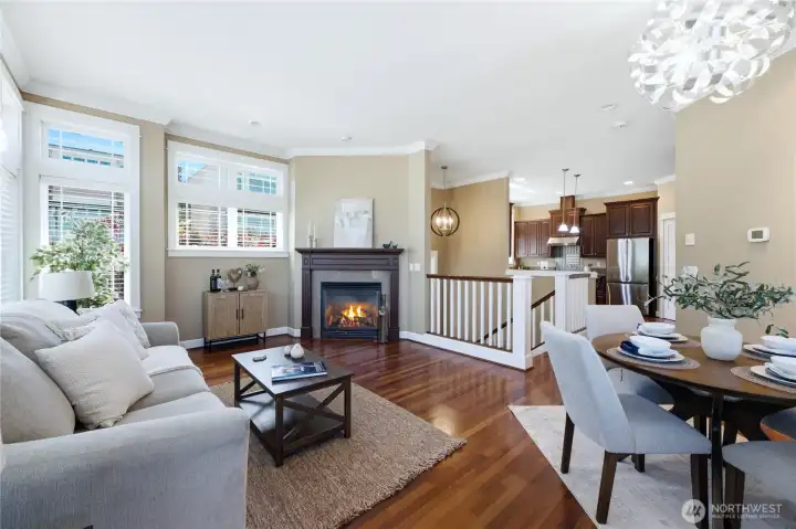 Spacious living room with oversized windows & dining room with deck off the dining room