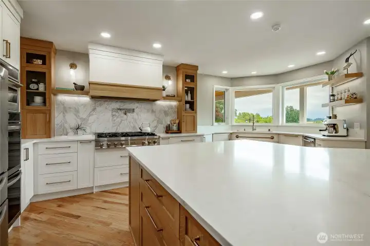 Well-designed new kitchen featuring beautiful wood & white cabinets, high-end appliances and storage for everything! Well-designed new kitchen featuring beautiful wood & white cabinets, high-end appliances and storage for everything!