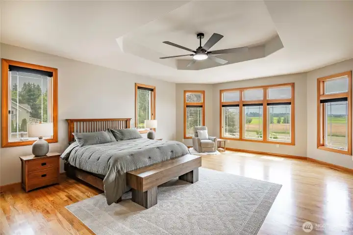 Large Primary bedroom with views overlooking the property. Large Primary bedroom with views overlooking the property.