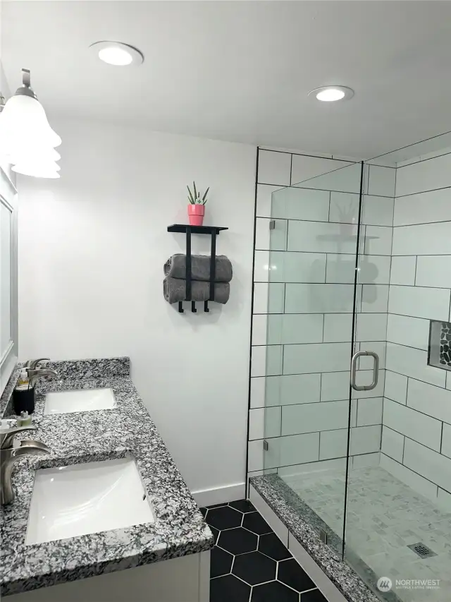 Primary Bathroom with double sinks and stunning walk in shower!