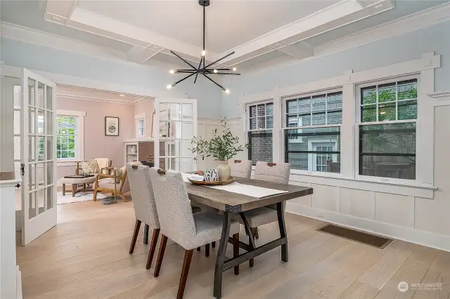 Formal dining area can be closed or flow into the living room fireplace seating.