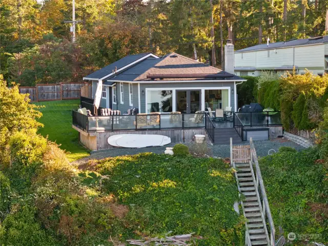 From inside the home you cannot see neighbors due to privacy landscaping.  Large remote awning (retracted in this photo) perfect for those hot sunny days