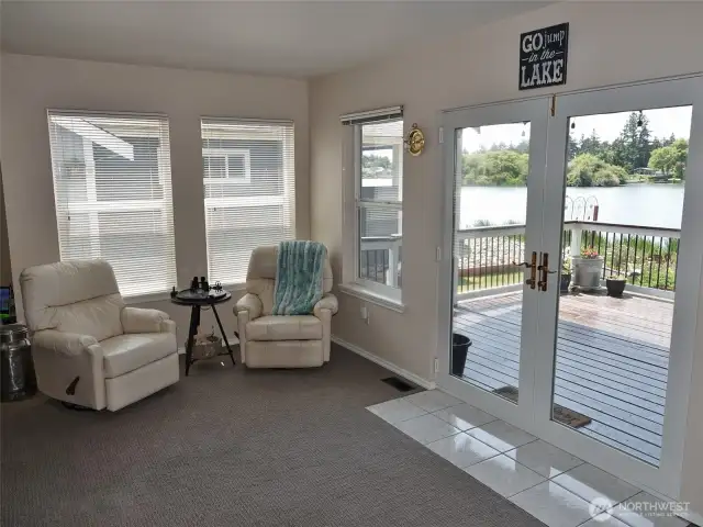 Family Room w/ doors leading out to the Rear Deck.