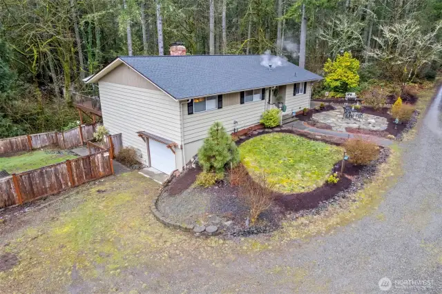 Welcome home to 6912 Hunt St. NW in Gig Harbor, WA, a 2396 sq. ft. cutie situated on a peaceful 1.01 acre lot, a rural location yet only 3 miles to town.