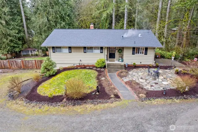 This home is nestled in the trees and is awaiting new owners to claim it for themselves.