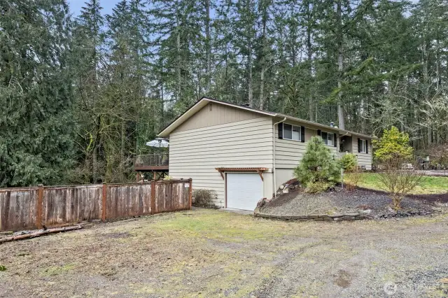 A deep one-car garage is a easy place to pull into to unload supplies without getting wet.