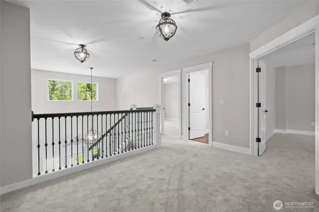 Upstairs landing with view of Jack and Jill bed and bath.