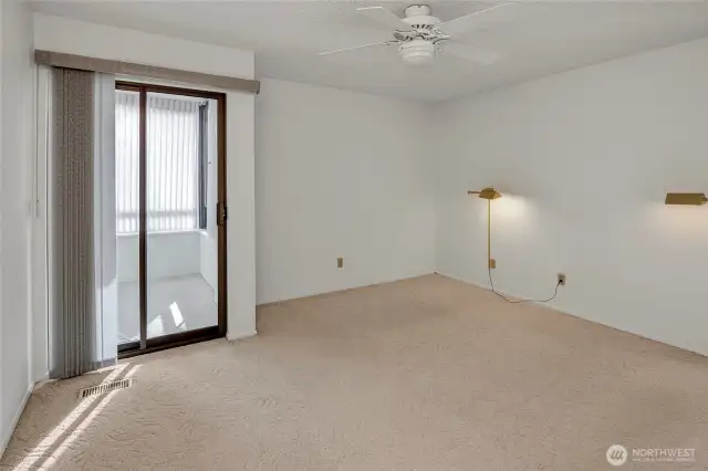 Primary bedroom with its own access to the sun porch