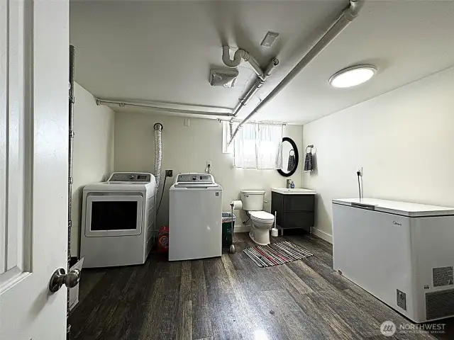 Extra large laundry room with half bathroom