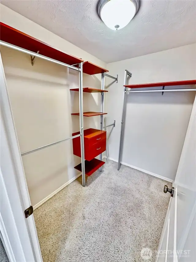 Primary walk-in closet.