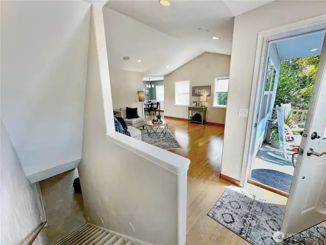 The lower level access is easily accessible just off the entry hall.