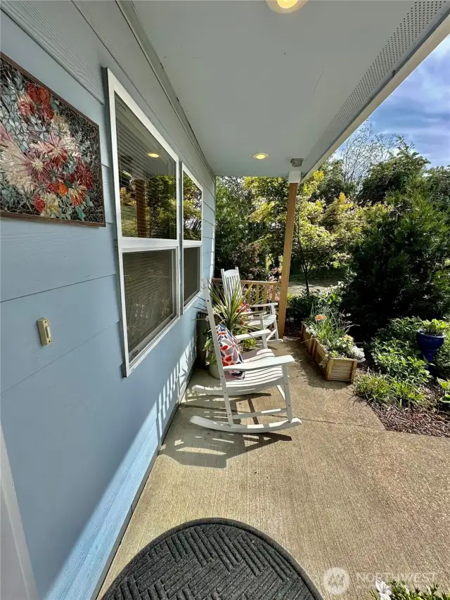 The inviting front patio offers a warm place to sit and sip a cup of coffee.