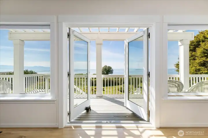 Spacious views of Puget Sound abound through the Home's 2nd floor French Doors out to the multileveled deck.