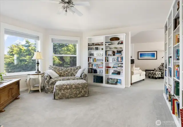 Next to the Music room (on 3rd level) is the Library with nine built-in bookcases (floor-to-ceiling) and a sitting area to enjoy reading your collection of books. Straight ahead is the entrance to the Primary Ensuite with a sliding "Barn" door.