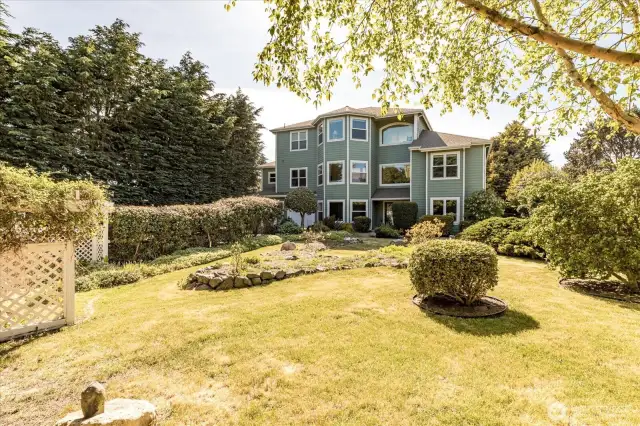 The home and front gardens are hidden from view by the surrounding fir trees, which allows for more privacy. In 2016, all new Windows & Doors were replaced, along with new Hardi-plank on the Eastside of the home.