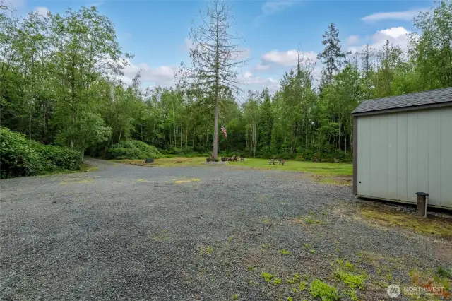 There is ample parking on site, with the driveway installed and the building site cleared.