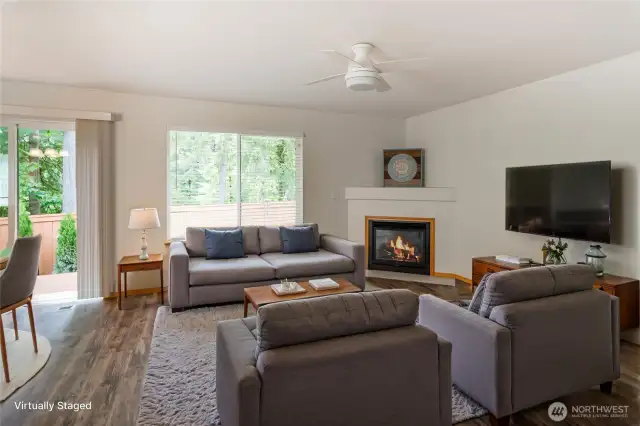 Gas fireplace in open living room.