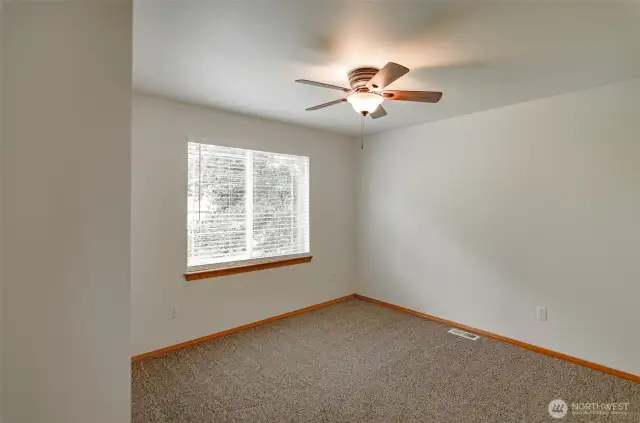 Another view of bedroom 2.  Both upper bedrooms have ceiling fans.