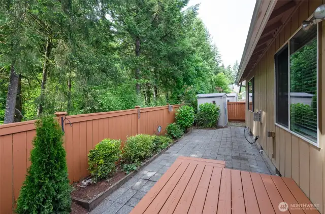 Easy care back yard.  Deck off dining area and extended patio.  Freshly painted fence.