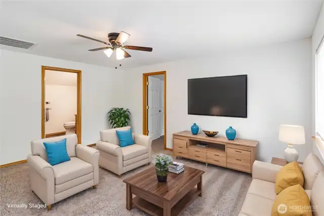 Upper level bonus room makes a wonderful TV room or play room.