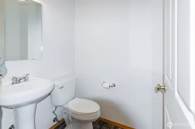Downstairs half bathroom.
