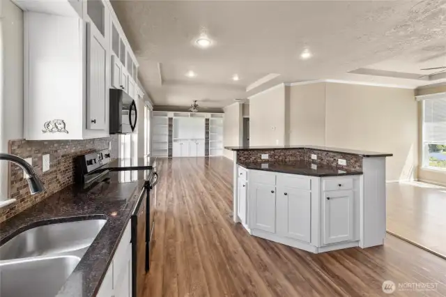Nice undermount double kitchen sink & tile backsplash!