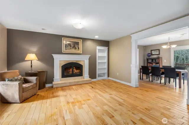 Living room with wood burning fireplace