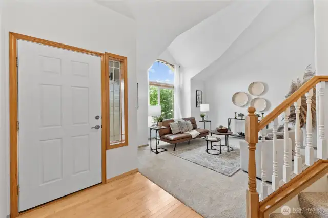 Upon entry is your formal living area with lots of natural light and TALL ceilings.