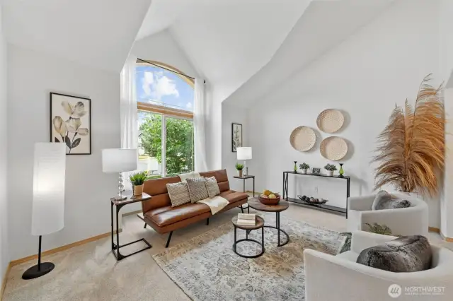 Extra tall windows keeps it light and bright and the brand new carpets makes this beautiful home shine.