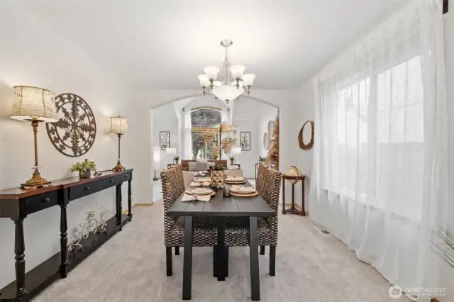 Large window for lots of natural light looks out to side yard.