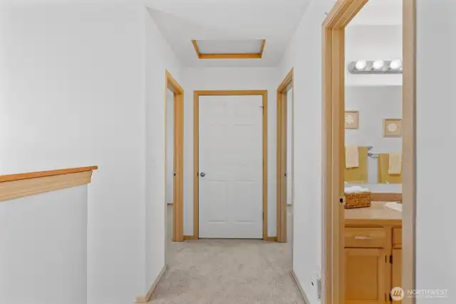 The 1st guest bedroom is on the left, linen closet straight ahead, 2nd bedroom and full bathroom on the right.