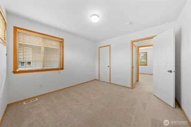 Bedroom #1. Spacious room with closet door to the left.