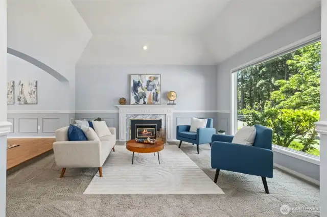 Stunning formal living room - again with a HUGE window, gas fireplace, marble surround for the fireplace.