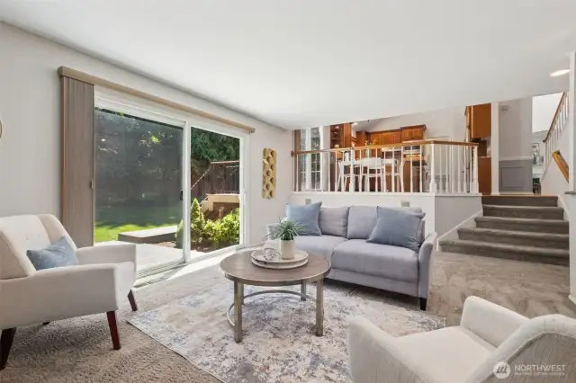 Looking back the whole house is connected for easy entertaining. Slider to the left here takes you out to the extended patio in the backyard.