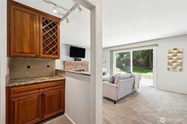 Closer view of the dry bar, a great storage area for your wine bottles, and glasses, and other serving ware.