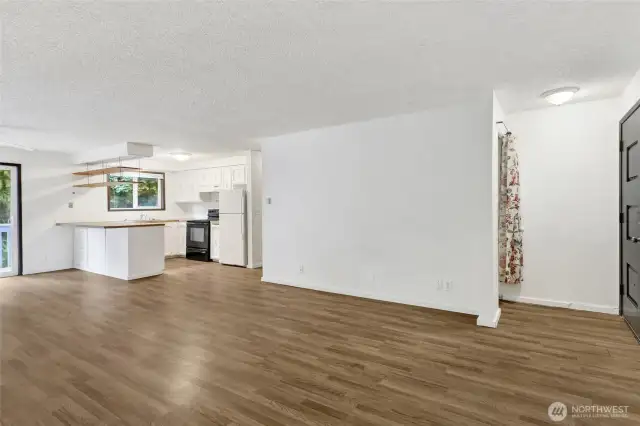 Vinyl laminate floors.  Entry closet.