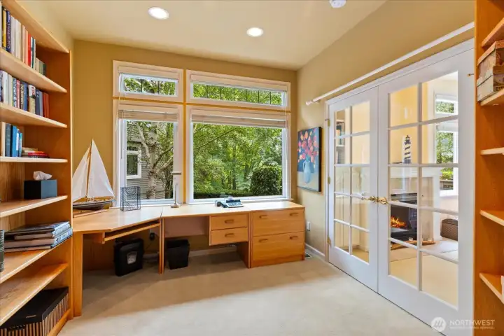 French doors to lower-level bedroom being used as an office