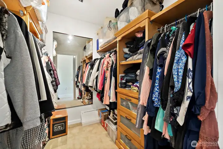 Primary bedroom walk-in closet.