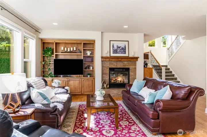 Enjoy the double-sided fireplace in the family room and formal living room.