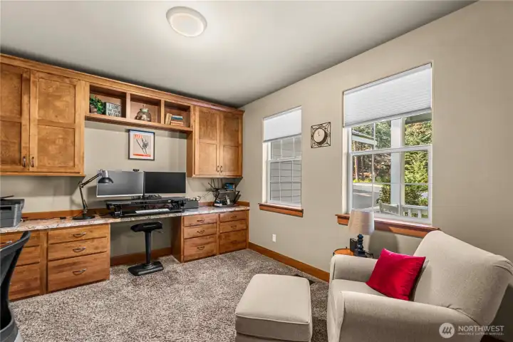 Office with built-ins, double door entry off foyer.