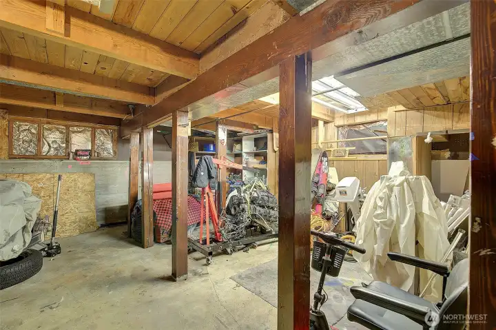 Shop space in this deep 2 car garage any car enthusiast would like to have.