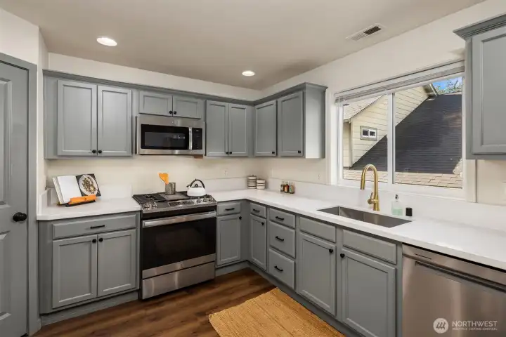 Immaculately updated kitchen with stylish finishes. Large pantry space if additional storage is needed.