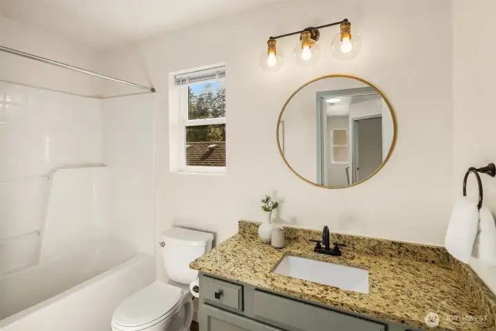 Second full bathroom on upper level.