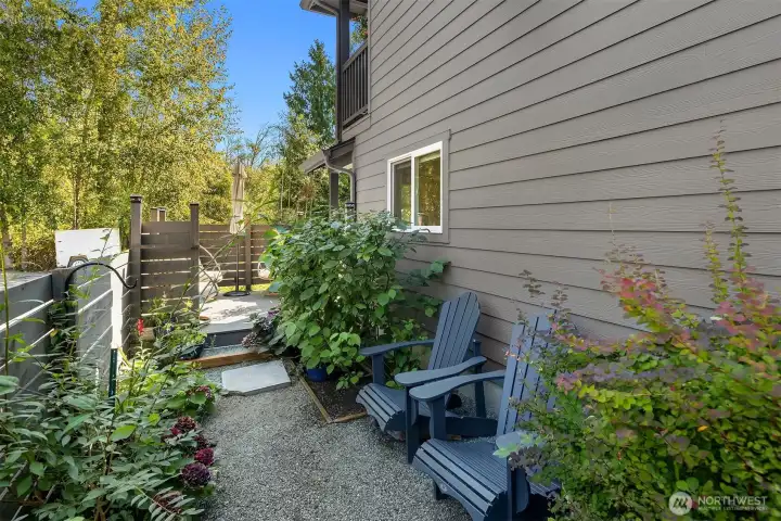 Additional seating and pathway to a sun-drenched patio!