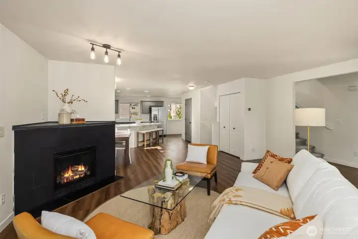 One of two fireplaces in the home. Perfect for a cozy night in. Extra wide staircase off of main floor takes you upstairs to bedrooms.