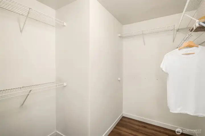 Large walk in closet in primary suite.