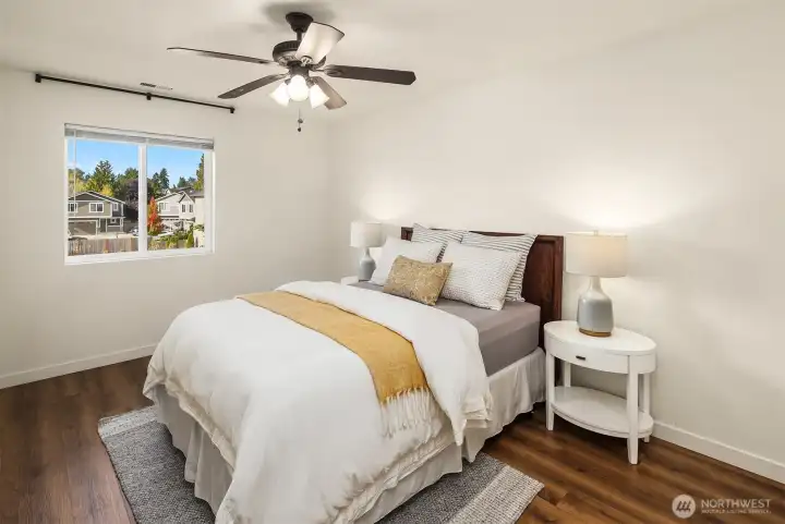 Spacious second bedroom with plenty of room for a king-sized bed - and wonderful light!