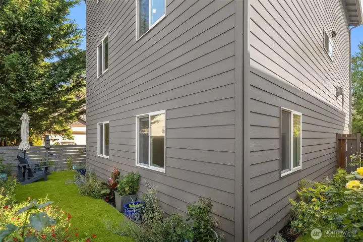 Coveted and secluded outdoor space wraps around the house. The previous sellers were able to host a 30 person shower in this space!