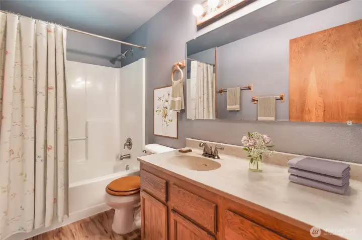 Full Bathroom.  Main  Virtually Staged