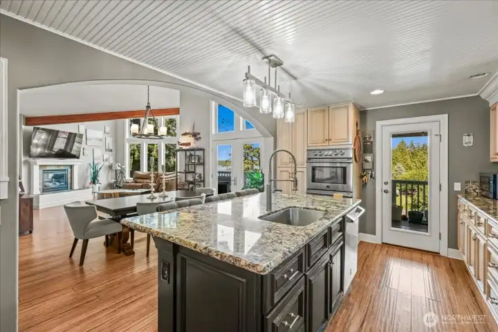 beautiful kitchen with door to the deck